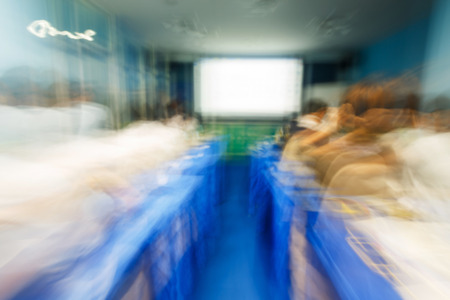 Abstract blurred people lecture in seminar room, education conceptの写真素材