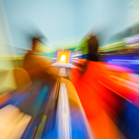 Abstract real lens zooming effect on notebook monitor in seminar room, creative idea conceptの写真素材