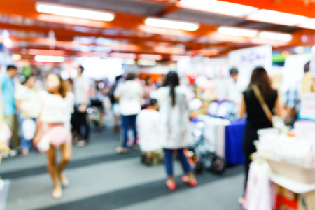 Abstract blurred people walking in shopping centreの写真素材