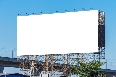Blank billboard on blue sky ready for new advertisementの写真素材