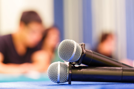 Close up old wireless microphone in conference room, education conceptの写真素材