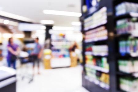 Abstract blurred people shopping in supermarket, urban lifestyle concept