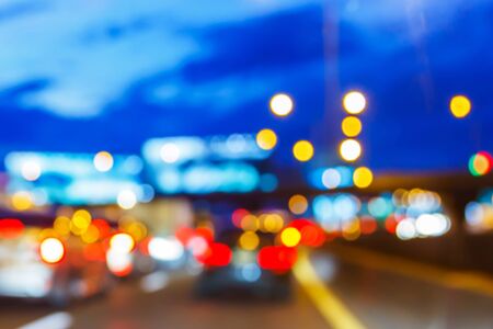 Blurred traffic jam with light bokeh with twilight sky, urban lifestyleの写真素材
