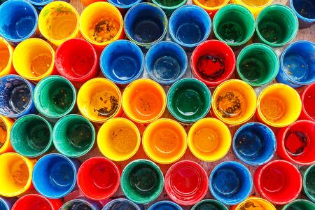 Abstract colorful dirty paint glasses backgroundの写真素材