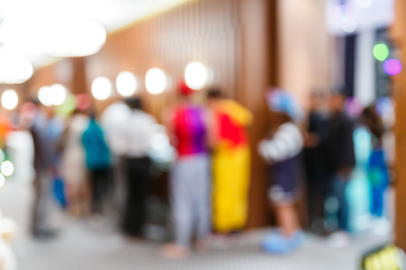 Abstract blur people walking in exhibition hall, trade show conceptの写真素材