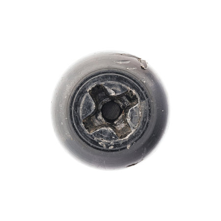 Close up old and scratched nut or screw head