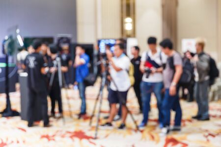 Abstract blur people in press conference meeting, new product launching, business event conceptの写真素材