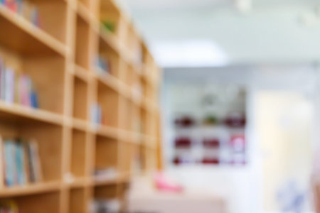 Abstract blur book shelf in living room, education or learning concept