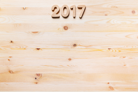 Year 2017 alphabet letter numeric number on old wooded backgroundの写真素材