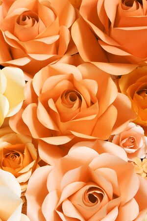Beautiful rose background decoration from paper, artificial or imitation flowerの写真素材