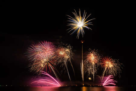 firework beautiful celebration festival colorful countdown merry christmas happy new year dark sky sparkle glowing cheerful anniversaryの写真素材
