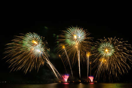 firework beautiful celebration festival colorful countdown merry christmas happy new year dark sky sparkle glowing cheerful anniversaryの写真素材
