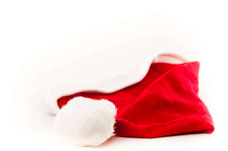 Red and fluffy isolated Christmas Santa Hatの写真素材