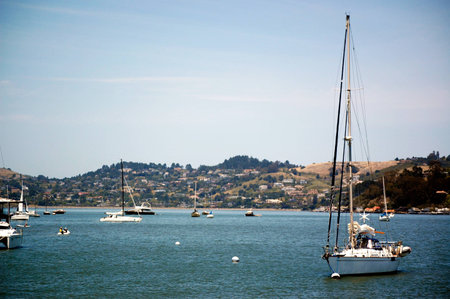 Sailing boat in the bay of a coastal villageの写真素材
