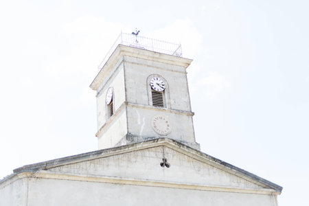 White Clock Tower in the South of Franceの写真素材