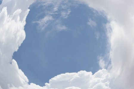 Fantastic soft white clouds against blue sky