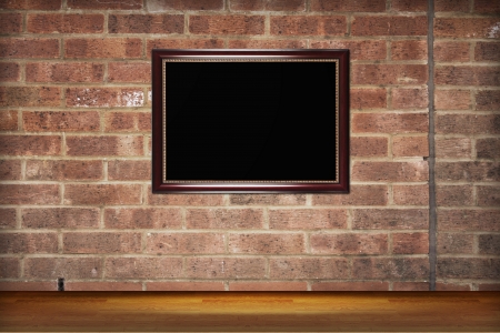 picture frame on wall to put your own pictures in の写真素材