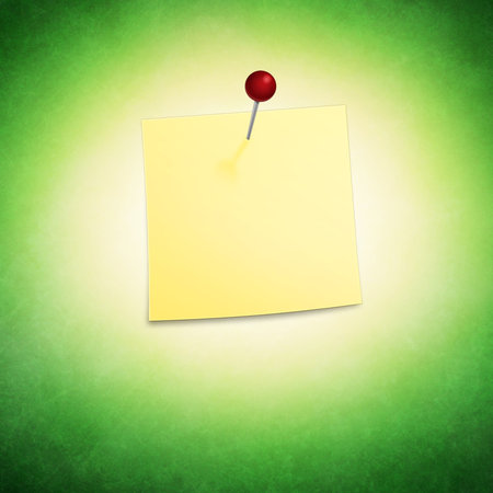 Yellow reminder note with red pin
