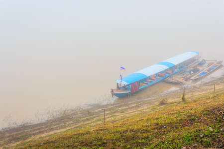 Boats in fog at Chiangkhan, Thailand の写真素材