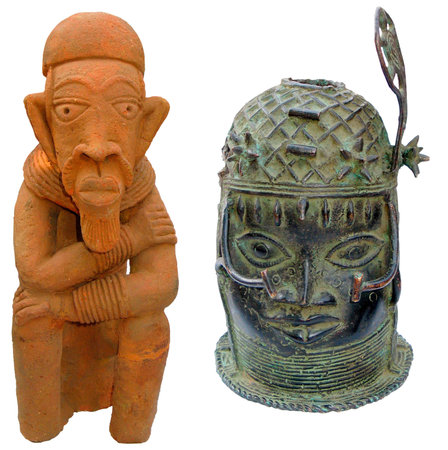 Original African sculpture on a white background