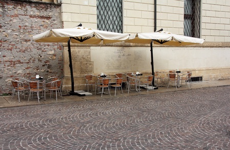 Empty cafe terrace in the center of Vicenzaの写真素材