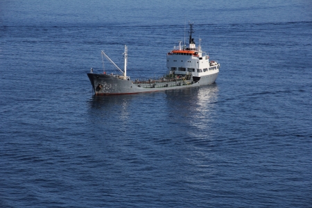 Small tanker ship at anchorの写真素材