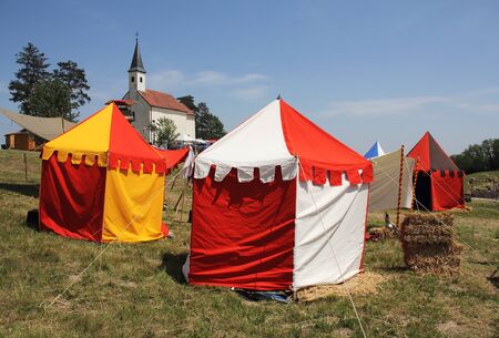 Sword of the tent camp on the lawnの写真素材