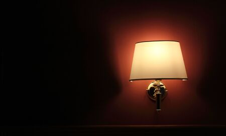Hotel wall Lamp housings of gold and linen shadesの写真素材