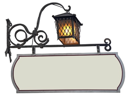 Blank, green shop sign made of wrought iron with lantern, isolated on white backgroundの写真素材