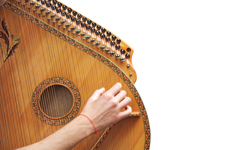 Man playing medieval lute, isolated on white background