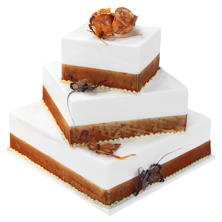 Great wedding cake of three parts, isolated on white backgroundの写真素材