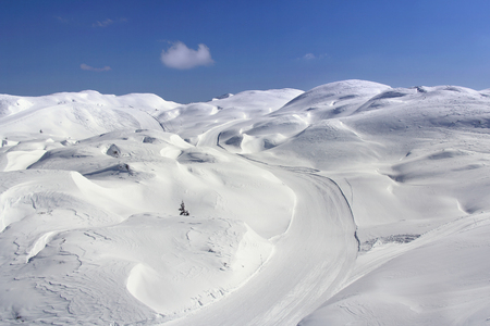 Great snow dunes and clouds in the background in Vogel, Sloveniaの写真素材
