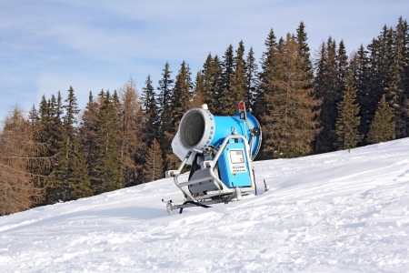 Blue snow cannon on the slopesの写真素材