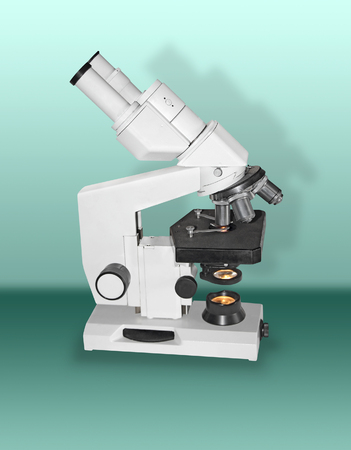 Laboratory Microscope on a green backgroundの写真素材