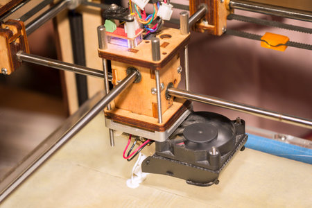 Detail of a 3D printer Prototype printing with a white ABS filament