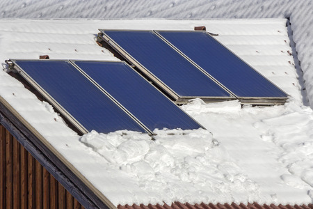 Photovoltaic Solar Panels on the roof Houseの写真素材
