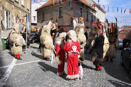 PTUJ, SLOVENIA - MARCH 1: Kurent is Slovene old traditional carnival mask with bells and dressed in fur. They chasing away the winter and calling spring. Ptuj, Slovenia March 1, 2014.のeditorial素材