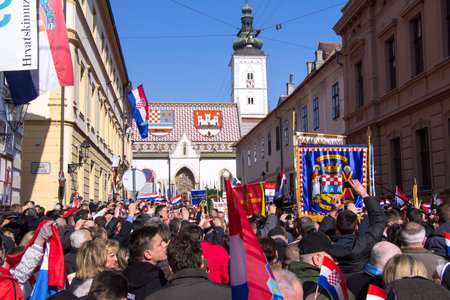 ZAGREB, CROATIA - FEBRUARY 15: Crowds of people attend inauguration of the first woman President of Croatia Kolinda Grabar Kitarovic, in front of St. Mark's Church, on February 15, 2015 in Zagreb.のeditorial素材