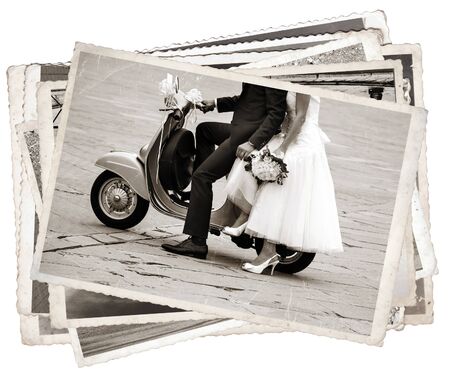 Vintage photos with Young newlywed just married, posing on an old gray scooterの写真素材