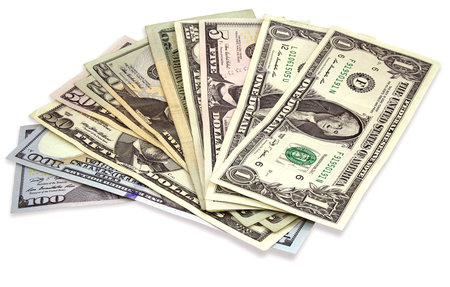 Many dollars banknotes isolated on a white background