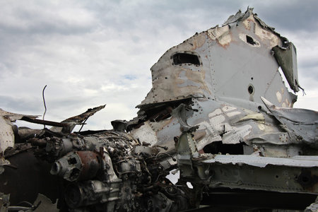 Crashed military plane, part of the engine and tail plane