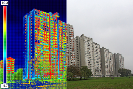 Infrared and real image showing lack of thermal insulation on Residential buildingの写真素材