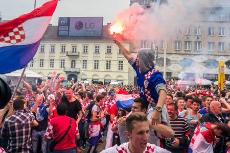 ZAGREB, CROATIA - JUNE 12 Croatian football fans on the Ban Jelacic Square, watching EURO 2016 match Turkey vs Croatia on June 12, 2016 in Zagreb, Croatiaのeditorial素材
