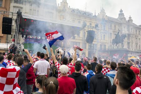 ZAGREB, CROATIA - JUNE 12 Croatian football fans on the Ban Jelacic Square, watching EURO 2016 match Turkey vs Croatia on June 12, 2016 in Zagreb, Croatiaのeditorial素材