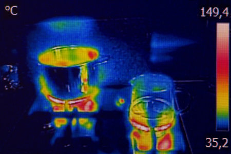 Infrared thermovision image showing cooking on a gas stove