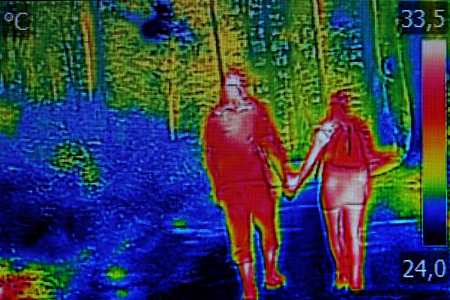 Infrared thermal image young couple, when walking through the woodsの写真素材