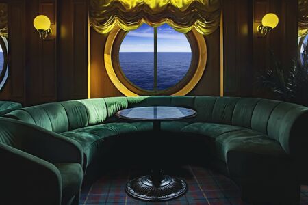 Lounge on a cruise ship, with tables and armchairの写真素材