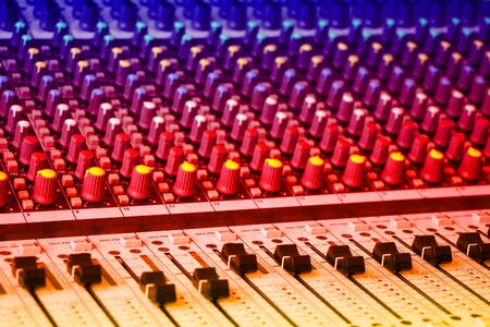 Sound mixing console with colorful backlit buttonsの写真素材