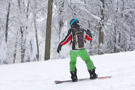 Winter sport snowboarder at ski slopeand alps mountains landscape
の写真素材