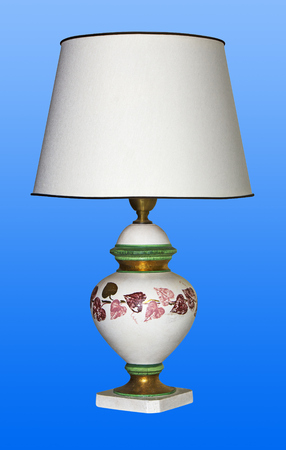 Vintage table lamp on a blue backgroundの写真素材